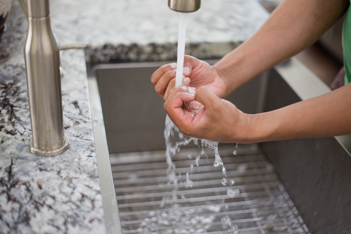 Hands washing under running water